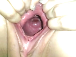 Petite Teen Proudly Showing Off Her Huge Gaping Pussy And Cervix