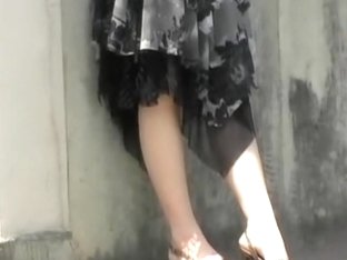 Classy Lady Waits For Her Cab And Gets Skirt Sharked