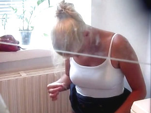 Hidden Home Camera Video Of A Blonde On A Toilet Bowl