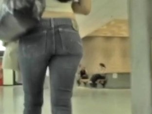 Brunette  Shopping And Showing Her Tight Jeans And Her Ass