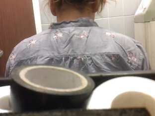 Amateur Girl Shot From The Back By A Hidden Camera In A Bathroom