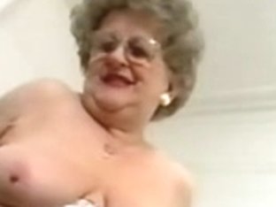 Dirty Granny Shows Off And Masturbates