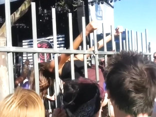 Blonde In The Cage Is Performing Erotic Strip Show In Public