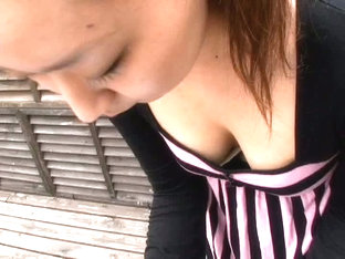 A Sexy Asian Chick Letting The Spy Cam Peek Down Her Blouse