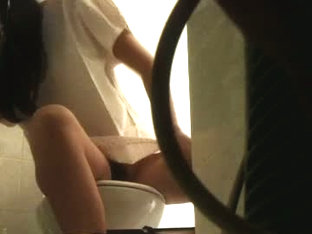 Peeing Hidden Cam Captures Babe Emptying Her Bladder On The Toilet