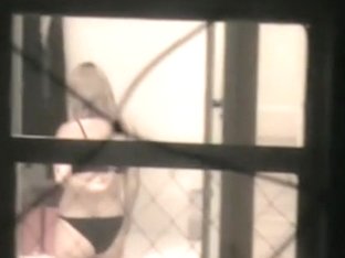 Girl Strips And Touches Nude Tits On Window Voyeur Movie