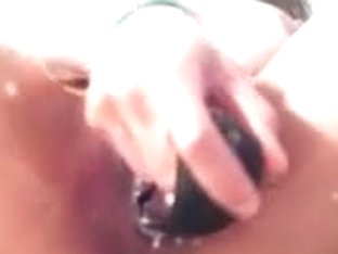 Busty Asian Plays With A Big Fat Dildo