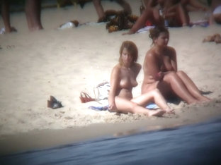 Buxom Blonde Filmed On A Nudist Beach