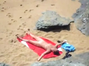 Nude Girl On Beach Sunning.