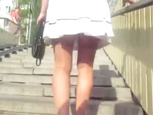 White Skirt And Tan Stockings Uptairs