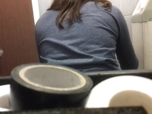 Brown-haired Lass Back Shots While Sitting On Throne