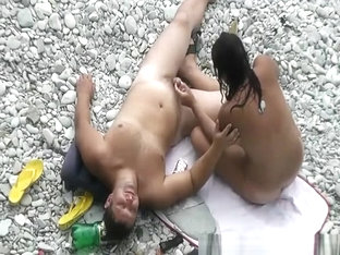 Black Hair Nudist And Her Man At Beach
