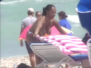 Plump Breasted Girl Caught In A Voyeur Beach Nudism Video