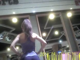 Brunette Chick With Nice Ass Exercising In The Gym