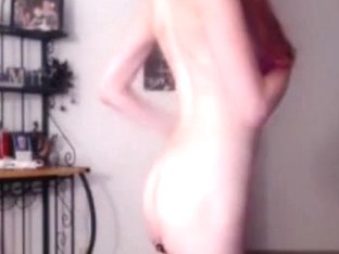 Tattooed Girl Strips For The Webcam