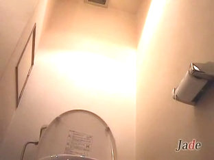Japanese Bimbos Taking A Piss In The Toilet On Hidden Camera