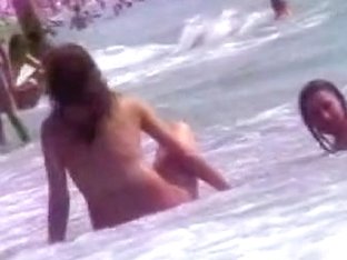 Smoking Hot Brunettes Are Relaxing On The Nudist Beach