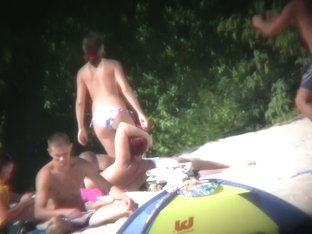 Nudist Beach With Dressed Gentlemen And Topless Ladies