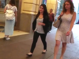 Sexy white girl walking with decent short one.