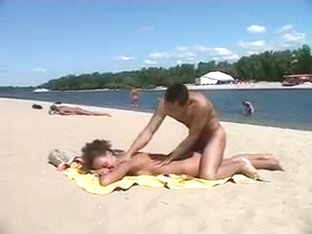 Girl At Nudist Beach Stripping Off Her Clothes And Smothered With Cream