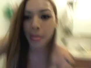 Small oriental taylor on her web camera two