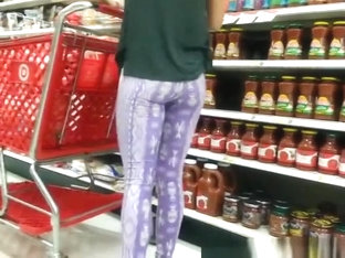 Woman In Purple Leggings With Nice Ass