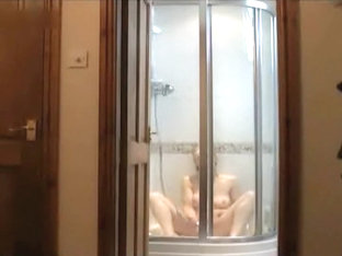 Milf spied masturbating in the shower