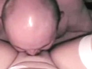 Bald husband eating his wifes pussy