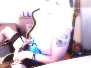 Smiling blonde shemale wanks off