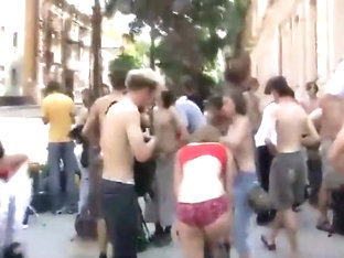 Naked students do a running protest