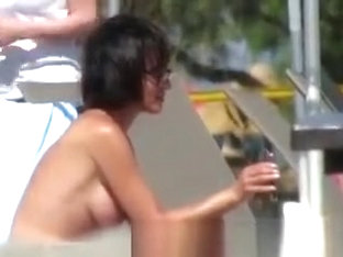 Short Hair Woman Topless At Beach