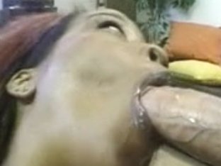 Dark doxy engulfing white penis and balls for cum