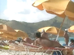 Beach Voyeur Video Of A Nude MILF And A Nude Asian Hottie