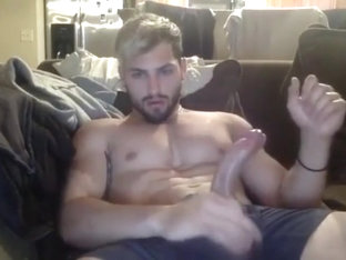 Gorgeous young guy wanking his big cock!