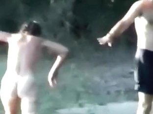 Voyeur Tapes A Slut Having A Threesome With 2 Guys In The Lake