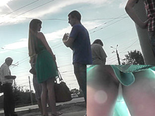 Upskirt voyeur scene at the bus stop with awesome lady