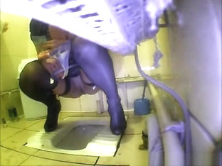 Pissing With Her Shaved Vagina
