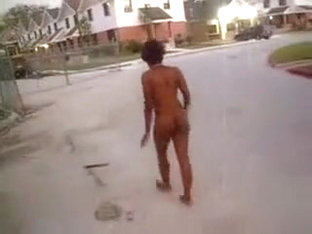 Ebony babe walks naked on the street