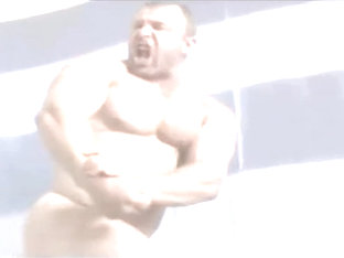 Beefy Rugby Player Showing Off His Muscle