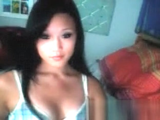 Gorgeous asian hottie getting naked