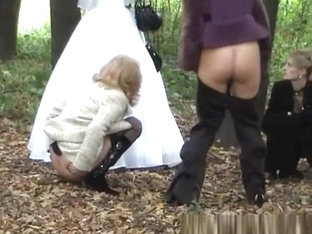 Three Ladies Help Bride Pee Outdoors