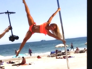 Blonde Lass Doing Her Pole Dancing Show