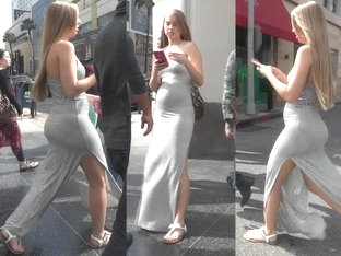 Strong wind plays with a Turkish girl's revealing dress