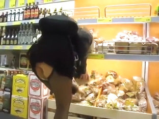 Sexy Pussy Flashes Her Skirt in Public Store