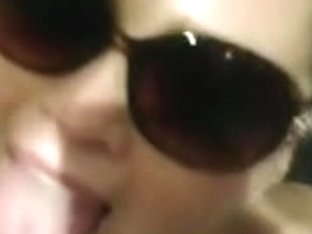 big beautiful woman in glasses receives facial