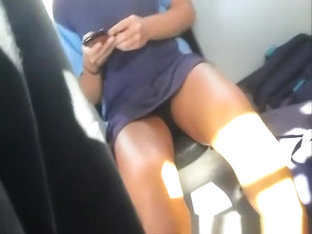 Girl With Sexy Legs Texting In The Bus