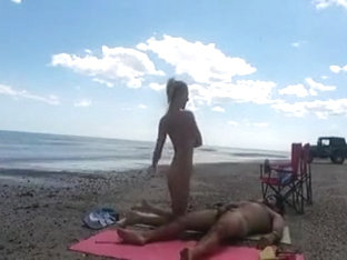 Nudist Wife Jerks Off Strangers At The Beach And They Cum On Her