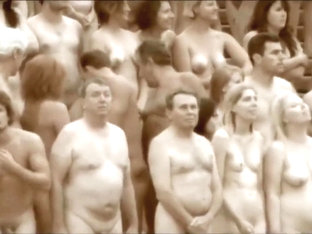 Thousands of people pose completely naked for an art creation