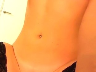 Attractive brunette AnnaZetaJones plays with pussy and tits