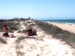 Couple On A Nude Beach